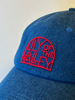 Baseball cap, blue jeans