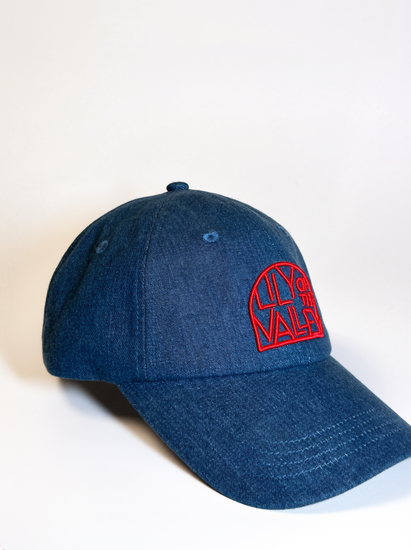 Baseball cap, blue jeans